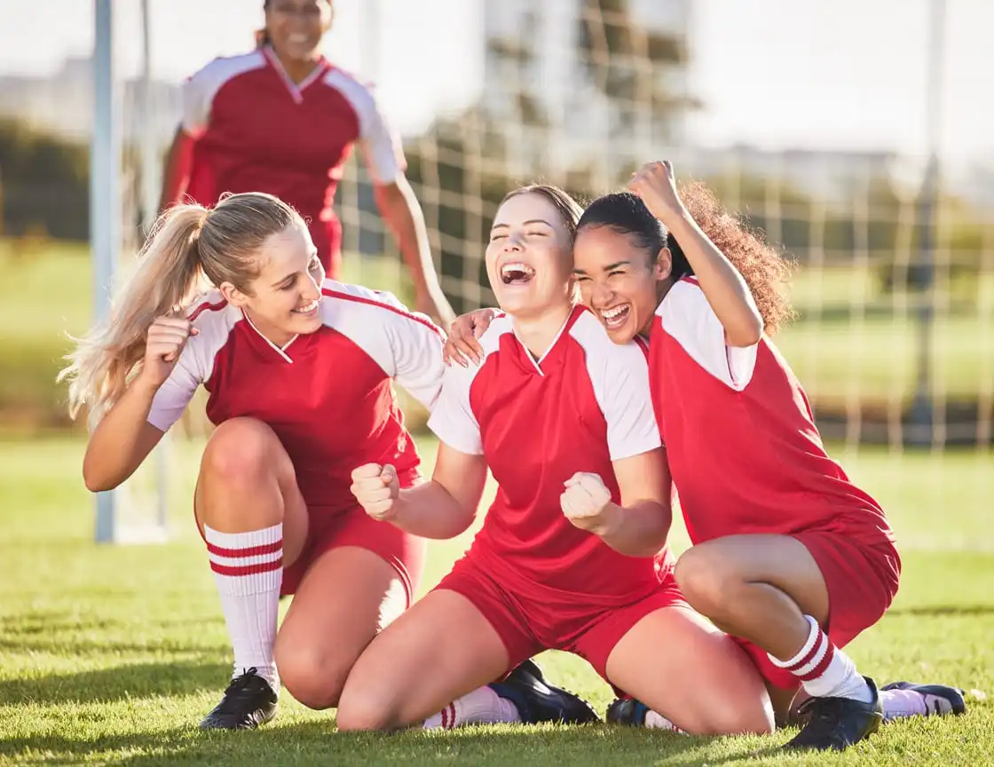A group of adult women on a soccer team.